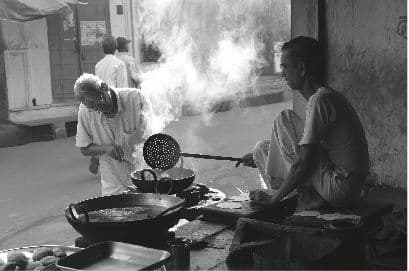 Cooking street food in India