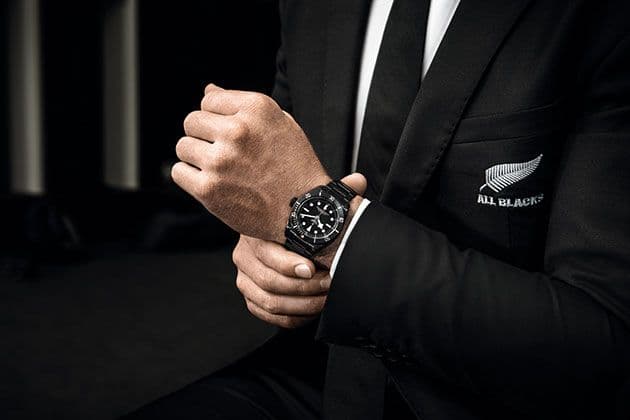 The Tudor Black Bay Dark contrasted against the All Blacks’ silver fern emblem