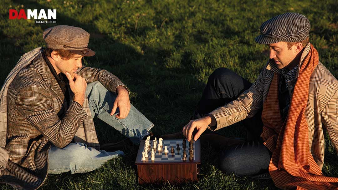 On Russell (left): Coat and scarves by banana Republic; shirt by hugo by hugo boss; jeans by Frame; hat by Goorin bros On Matthew (right): Coat by Zara; shirt by Polo Ralph Lauren; jeans by Rag & bone; scarf by eton; hat by Goorin bros