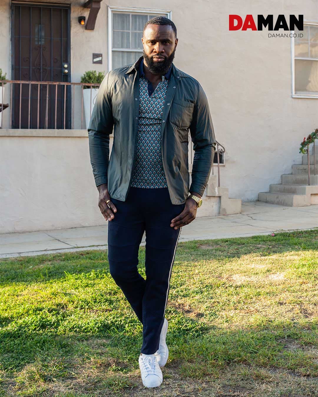 Jacket by Reiss; shirt by 4 Funky Flavours; pants by A. Tiziano; shoes by Adidas