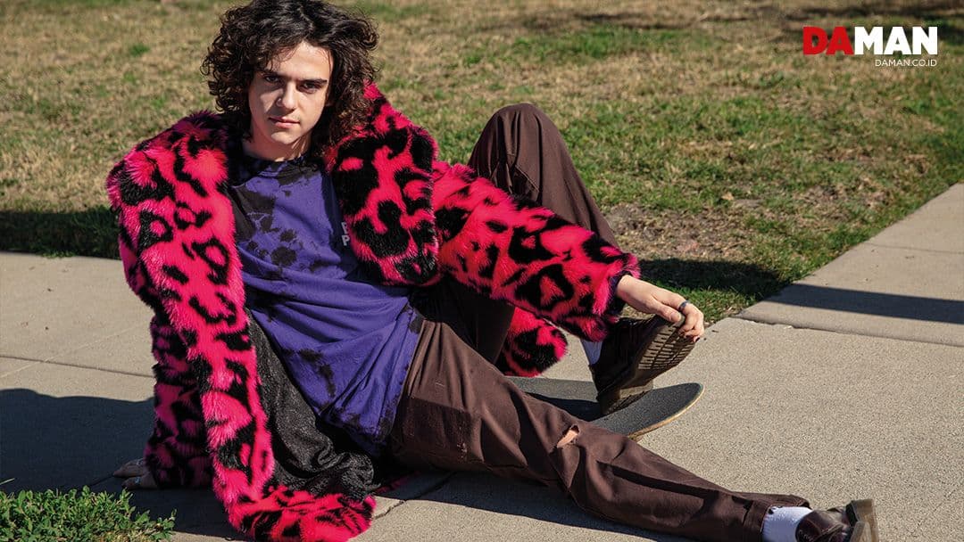  Shirt by Broken Promises; pants by Dickies; jacket by SpiritHoods; socks by Alexander McQueen; shoes by Dr. Marten’s