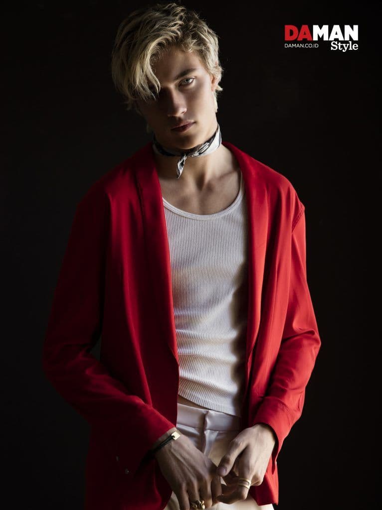 DA MAN STYLE Outtake Lucky Blue Smith tank top by Palace Costume, jacket and trousers by baja East, neckerchief by Vivienne Westwood, bracelet by luis Morais