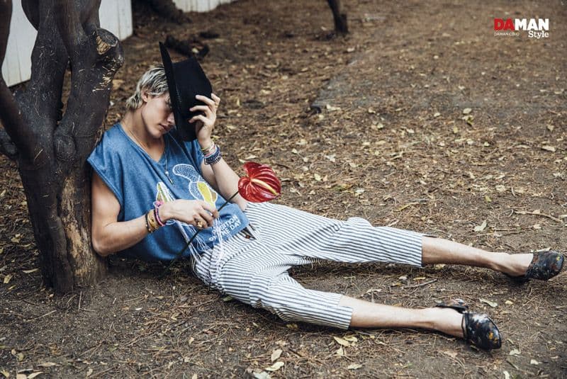 Lucky Blue Smith in t-shirt by bernhard Willhelm, trousers by Vivienne Westwood, hat and shoes by Palace Costume, accessories by luis Morais