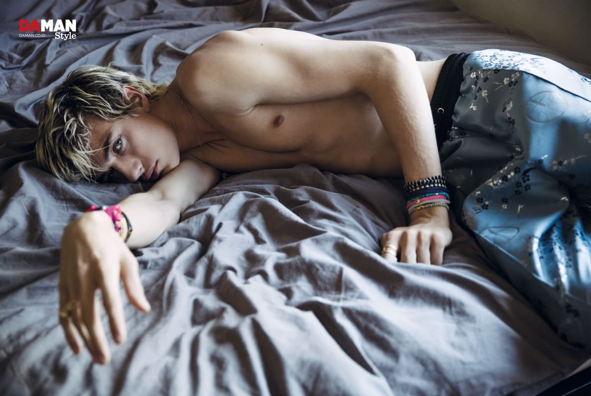 Lucky Blue Smith in trousers by astrid andersen, accessories by luis Morais