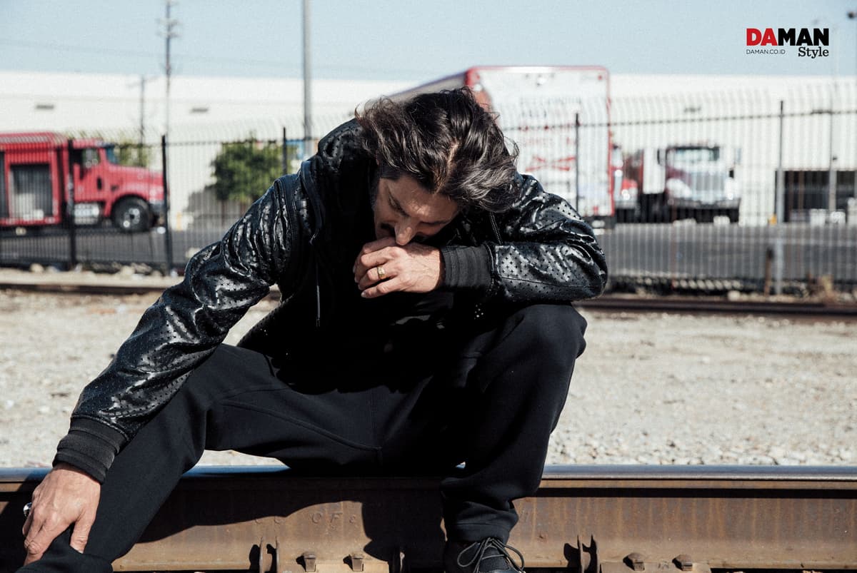 Tony Ward in Leather jacket and shirt by Givenchy by Riccardo Tisci, trousers by Louis Vuitton, shoes by 3.1 Phillip Lim