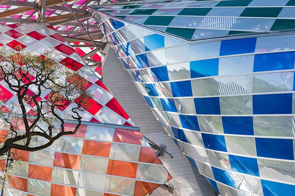 fondation louis vuitton gets a rainbow makeover from daniel buren-1
