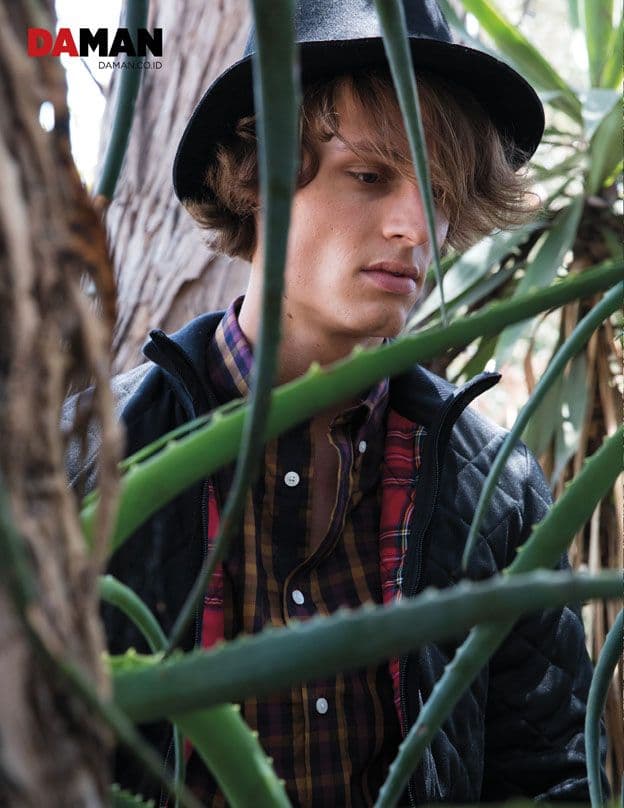 Model Andrew Raymond Thomas in Jacket and shirt by Fred Perry, hat by Contraband Hats