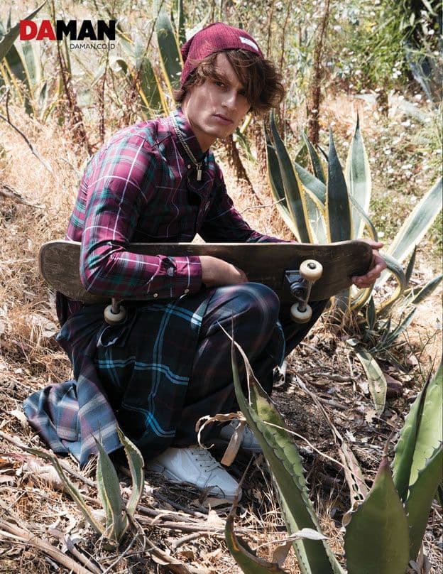 Model Andrew Raymond Thomas in Shirt and pants by etro, shirt by Fred Perry, shirt by Fred Perry, hat by contraband hats, necklace by Saint laurent, shoes by christian loubo