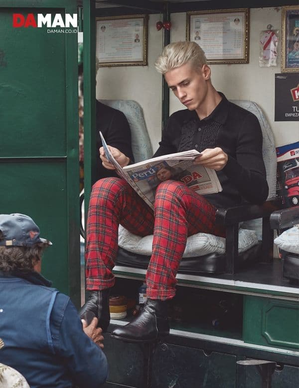 Model Oliver Stummvoll by GREG SWALES in Polo shirt by Bottega Veneta, trousers by Department 5, shoes by Calvin Klein