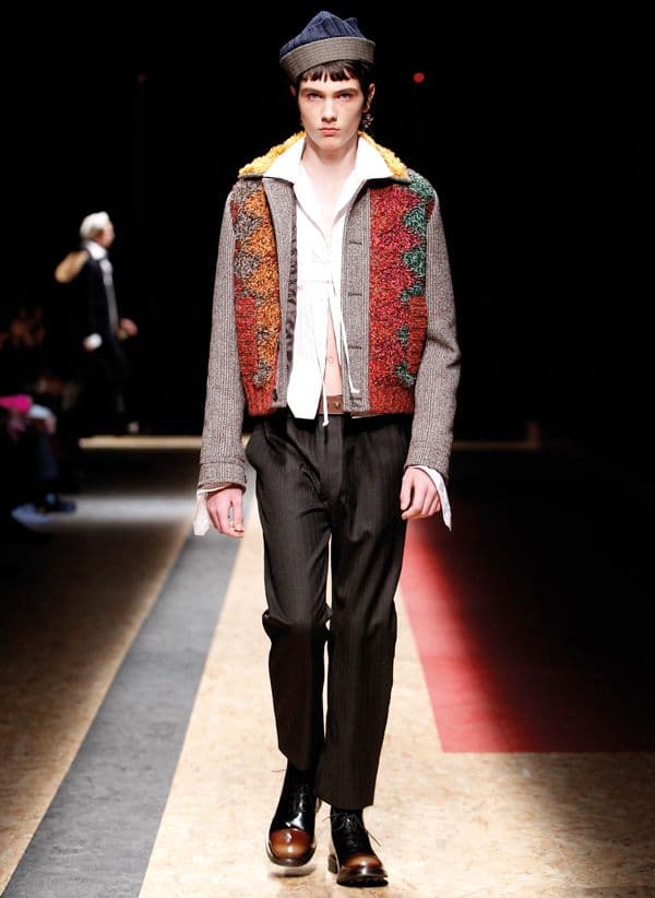 A “troubled” sailor-inspired ensemble on Prada’s runway