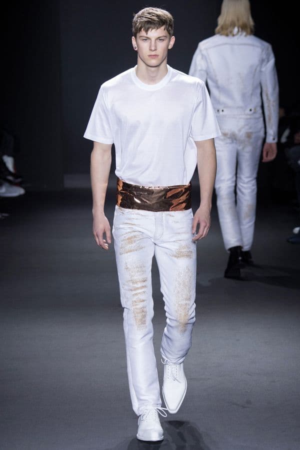 A golden sash and denim-looking jacquard pants on Calvin klein Collection’s runwaY