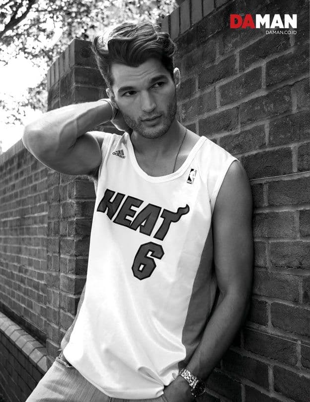 Model Jon Hosking in Top by Adidas, denim pants by Levi's