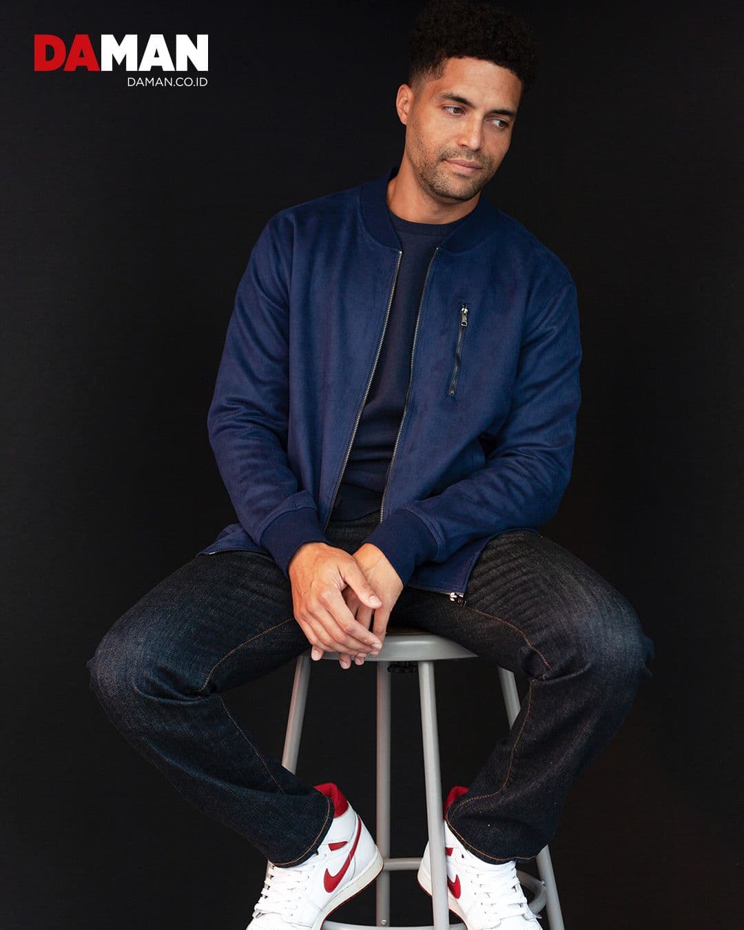 Jacket by Ben Sherman; pants by Polo Ralph Lauren; pullover by John Varvatos; pants by Polo Ralph Lauren; shoes by Nike