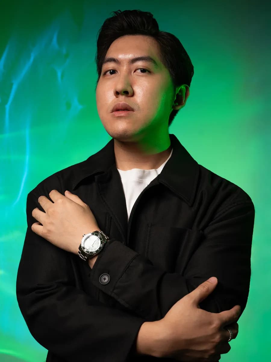 Adianto Salim wearing the Grand Seiko Spring Drive U.F.A. Ushio 300 Diver SLGB025 with green dial from the Evolution 9 Collection