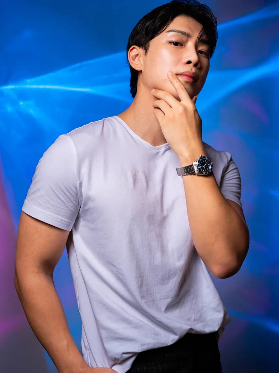 Evan Lee wearing the Grand Seiko Spring Drive U.F.A. Ushio 300 Diver SLGB025 with green dial from the Evolution 9 Collection